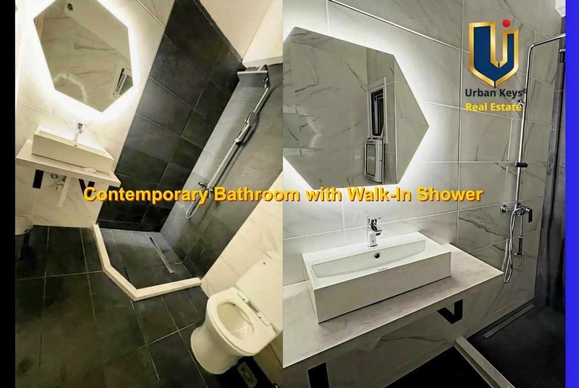 Contemporary renovated bathroom with walk-in shower in furnished apartment for rent in central Athens