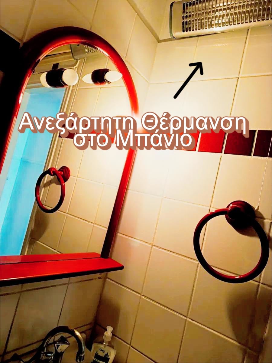 Μπάνιο Διαμερίσματος Πλατεία Κολιάτσου | ΚΑ 150-1035 Καθρέπτης και νιπτήρας στο μπάνιο επιπλωμένου διαμερίσματος 65 τ.μ. προς ενοικίαση στην Πλατεία Κολιάτσου, Πατήσια